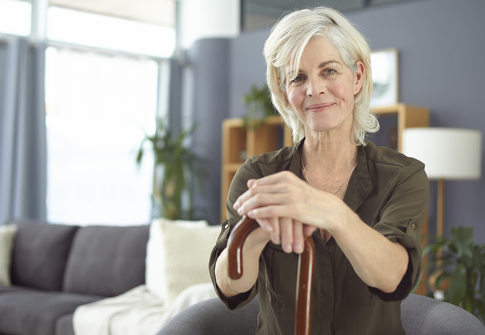 Woman holding cane