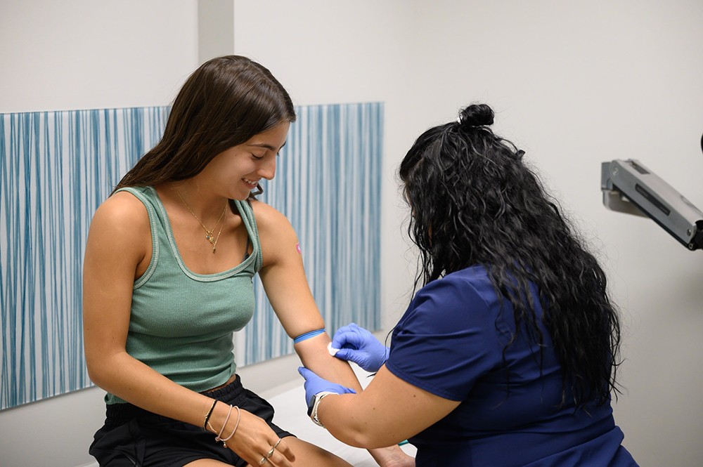 Adolescent patient and nurse